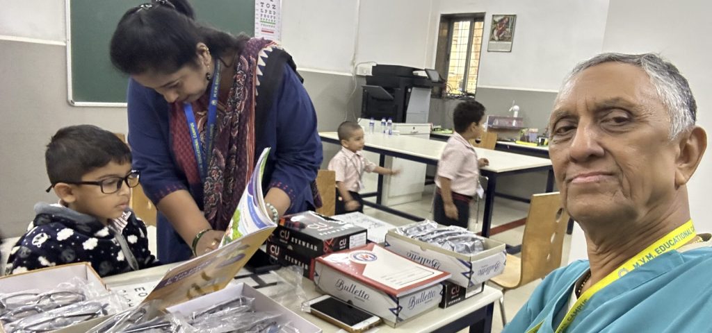 Distributing free eyeglasses to children after their exams